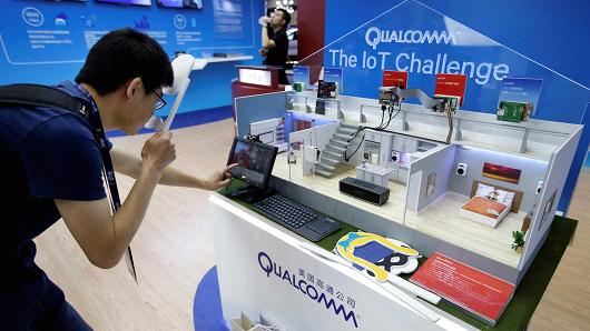 A man visits Qualcomm's booth at the Global Mobile Internet Conference 2017 in Beijing, China April 28, 2017.