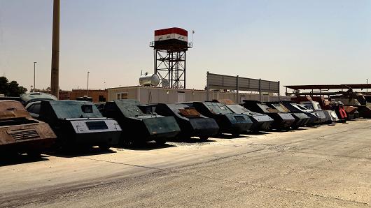 Vehicles used for suicide car bombings, made by Islamic State militants, are seen at Federal Police headquarters after being confiscated in Mosul.