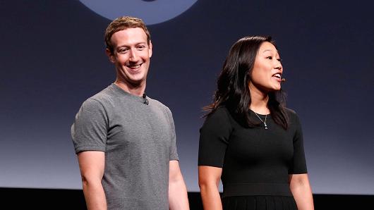 Priscilla Chan (R) and her husband Mark Zuckerberg announce the Chan Zuckerberg Initiative to "cure, prevent or manage all disease" by the end of the century during a news conference at UCSF Mission Bay in San Francisco, September 21, 2016.
