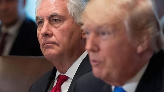 President Donald Trump speaks alongside Secretary of State Rex Tillerson (L) during a Cabinet Meeting in the Cabinet Room at the White House in Washington, DC, December 20, 2017.