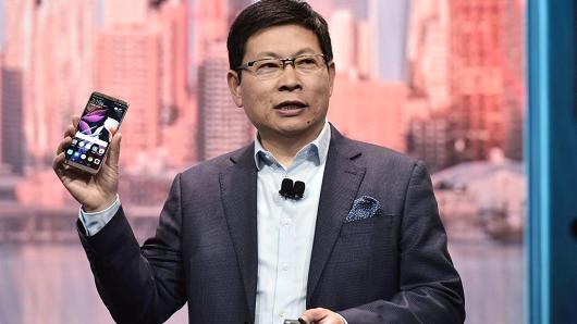 Huawei consumer business CEO Richard Yu speaks about the Mate 10 Pro phone during a keynote address during CES 2018 in Las Vegas on January 9, 2018.