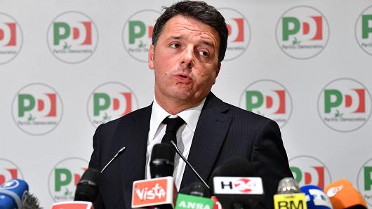 Former Prime Minister and leader of the Democratic Party (PD), Matteo Renzi, gives a press conference a day after Italy's general elections on March 5, 2018 at the PD headquarters in Rome. Renzi, leader of the ruling centre-left Democratic Party, said he was resigning after the party suffered a crushing defeat in Sunday's general elections.