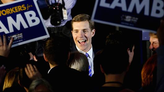 Democratic congressional candidate Conor Lamb is greeted by supporters during his election night rally in Pennsylvania's 18th U.S. Congressional district special election against Republican candidate and State Rep. Rick Saccone, in Canonsburg.