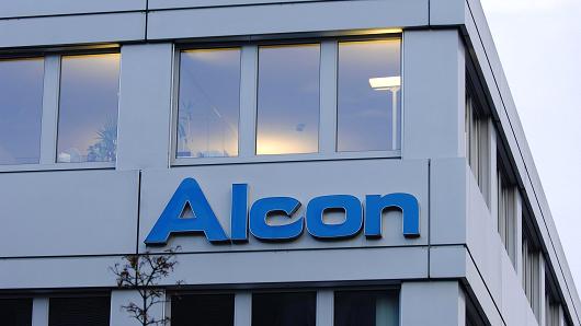 The logo of Alcon is seen on the company's corporate headquarters in Huenenberg, Switzerland, on Monday, Jan. 4., 2010.