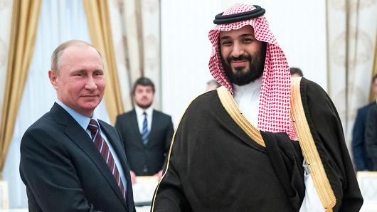 Russian President Vladimir Putin (L) shakes hands with Saudi Deputy Crown Prince and Defence Minister Mohammed bin Salman during a meeting at the Kremlin in Moscow on May 30, 2017.