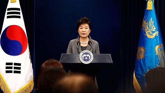 South Korean President Park Geun-Hye makes a speech during an address to the nation, at the presidential Blue House in Seoul on November 29, 2016.