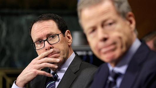 Chief Executive Officer of AT&T Randall Stephenson (L) and Chairman and Chief Executive Officer of Time Warner Jeffrey Bewkes listen to testimony before the Senate Judiciary Committee Antitrust Subcommittee hearing on the proposed deal between AT&T and Time Warner in Washington, U.S., December 7, 2016.