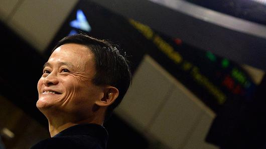 Alibaba founder Jack Ma waits on the floor at the New York Stock Exchange in New York on September 19, 2014.