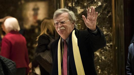 John Bolton, former United States Ambassador to the United Nations, waves as he leaves Trump Tower, December 2, 2016.