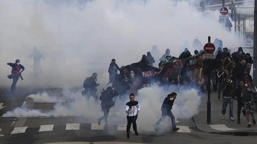 Police use water cannons and tear gas to clear protesters during a demonstration in support of the Notre-Dame-des-Landes ZAD (Zone a Defendre - Zone to defend) anti-airport camp on April 14, 2018, in Nantes, western France.