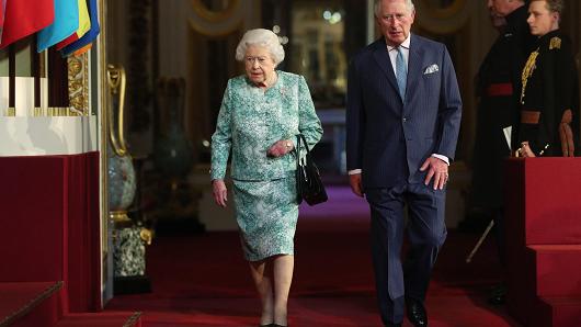 Queen Elizabeth II and Prince Charles, Prince of Wales, attend the formal opening of the Commonwealth Heads of Government Meeting at Buckingham Palace on April 19, 2018, in London, England.