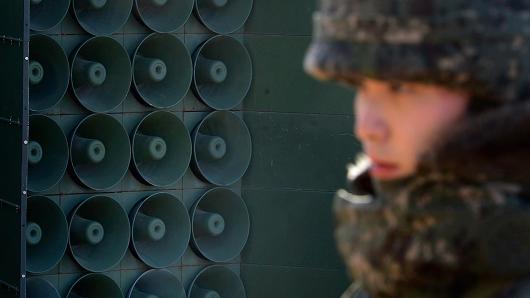 A South Korean soldier stands next to the loudspeakers near the border area between South Korea and North Korea on January 8, 2016 in Yeoncheon, South Korea.