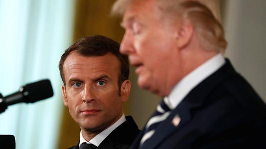 President Donald Trump speaks as French President Emmanuel Macron looks on during their joint news conference at the White House in Washington, U.S., April 24, 2018.