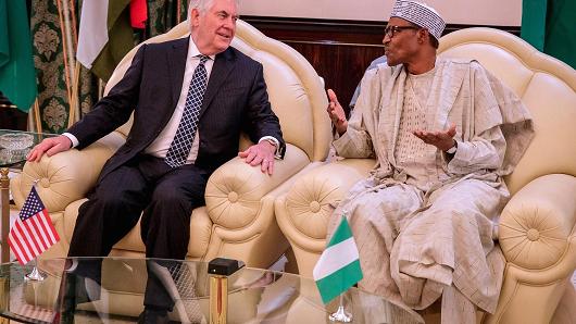 Then U.S. Secretary of State Rex Tillerson (L) and Nigerian President Muhammadu Buhari in Abuja, Nigeria, on March 12, 2018.