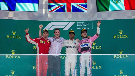 The winners 1st Lewis Hamilton, 2nd Kimi Räikkönen and 3rd Sergio Perez on the podium during the award ceremony at Azerbaijan Formula 1 Grand Prix on Apr 29, 2018 in Baku, Azerbaijan