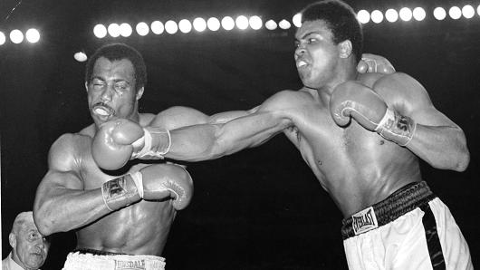 Muhammad Ali (R) connects a right punch against Ken Norton during the fight at the Sports Arena on March 31,1973 in San Diego, California.