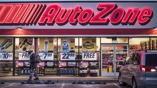 A man walks outside an AutoZone store in Albuquerque, New Mexico.