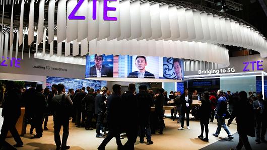 People at ZTE's booth during Mobile World Congress in Barcelona, Spain, February 27, 2017.