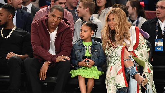 Jay Z, Blue Ivy Carter and Beyonce Knowles attend the 66th NBA All-Star Game at Smoothie King Center on February 19, 2017 in New Orleans, Louisiana.