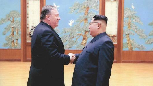 A U.S. government handout photo released by White House Press Secretary Sarah Huckabee Sanders shows U.S. Central Intelligence (CIA) Director Mike Pompeo meeting with North Korean leader Kim Jong Un in Pyongyang, North Korea in a photo that Sanders said was taken over Easter weekend 2018.
