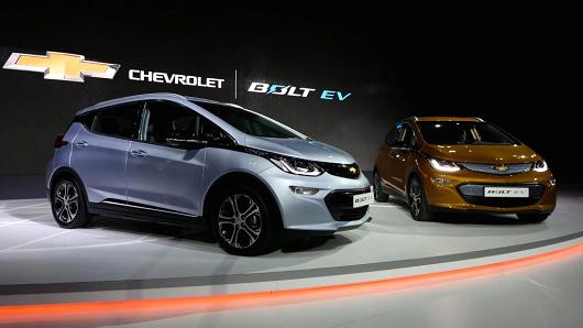 General Motors' Chevrolet Bolt stand on display during the press day of the Seoul Motor Show in Goyang, South Korea, on Thursday, March 30, 2017.