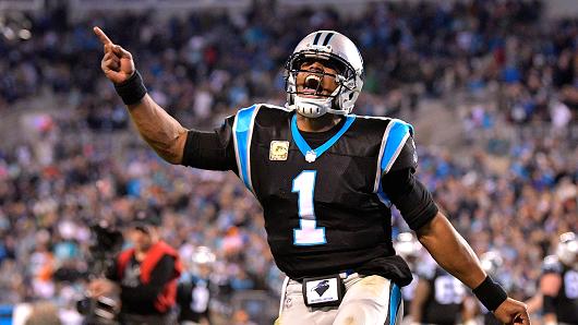 Cam Newton #1 celebrates after a touchdown against the Miami Dolphins during their game at Bank of America Stadium on November 13, 2017 in Charlotte, North Carolina.