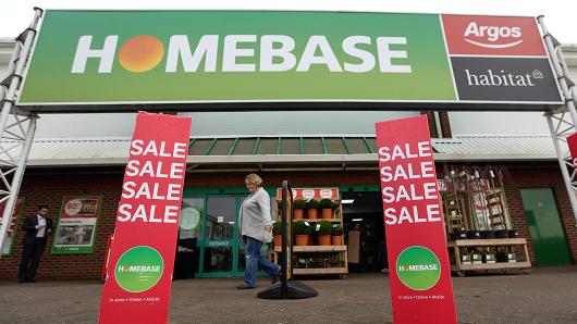 A customer leaves a Homebase store, part of Home Retail Group Plc, in Sevenoaks, U.K., on Wednesday, Jan. 6, 2016. U.K. grocer J Sainsbury Plc plans to buy Walmart Inc.s Asda in a 7.3 billion-pound ($10 billion) deal that would transform the countrys supermarket industry and leave the U.S. retailer as the combined companys biggest shareholder. Our editors select the best archive images of the two supermarket chains.