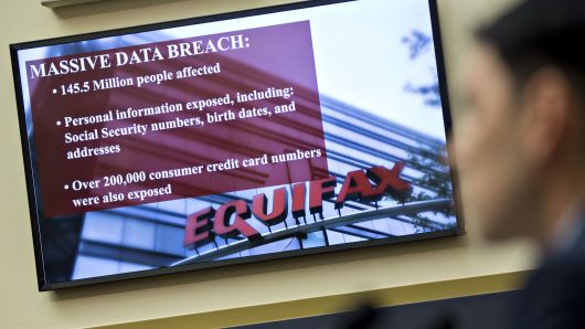An Equifax Inc. slide is displayed on a monitor during a House Financial Services Committee hearing in Washington, D.C., on Wednesday, Oct. 25, 2017.