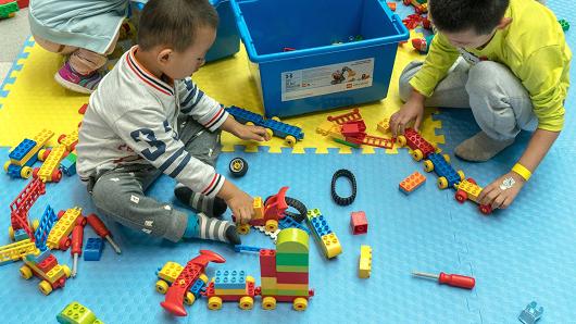 Children playing with Lego sets in Tianjin, China.
