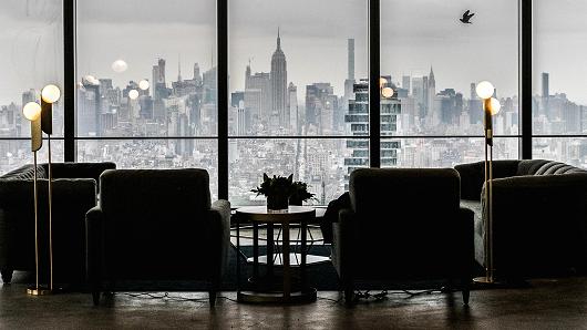 The Manhattan skyline is seen past furniture displayed on the 68th floor during a tour of the 3 World Trade Center (WTC) building in New York, U.S., on Tuesday, May 22, 2018.