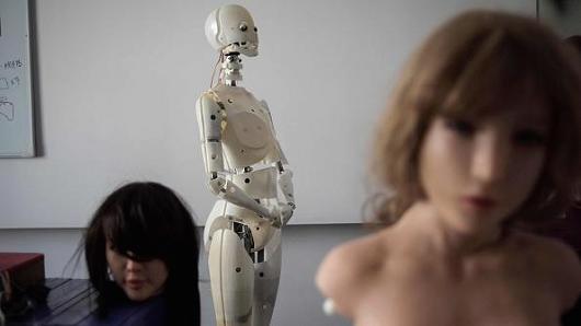 Robots in a lab of a doll factory of EXDOLL, a firm based in the northeastern Chinese port city of Dalian.