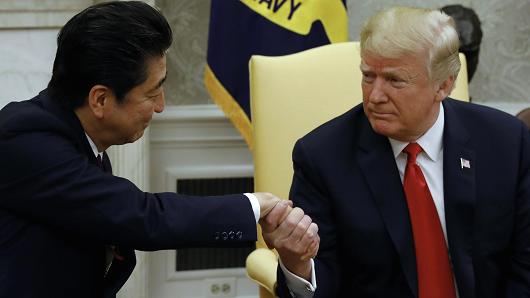 U.S. President Donald Trump meets with Japanese Prime Minister Shinzo Abe in the Oval Office of the White House on June 7, 2018.