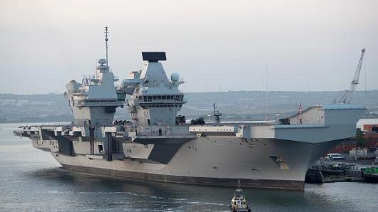 Britain's new aircraft carrier HMS Queen Elizabeth is seen anchored in the dockyard on June 8, 2018 in Portsmouth, England.