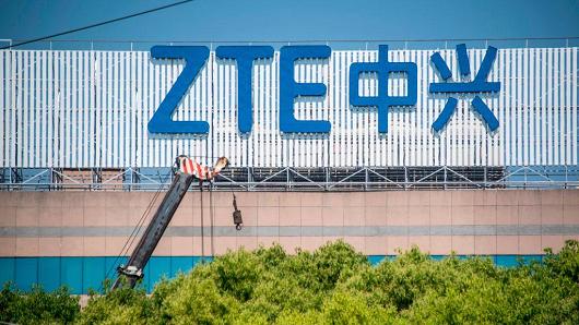 A logo of Chinese telecommunications company ZTE is seen on an office building in Shanghai, China, on May 3, 2018.