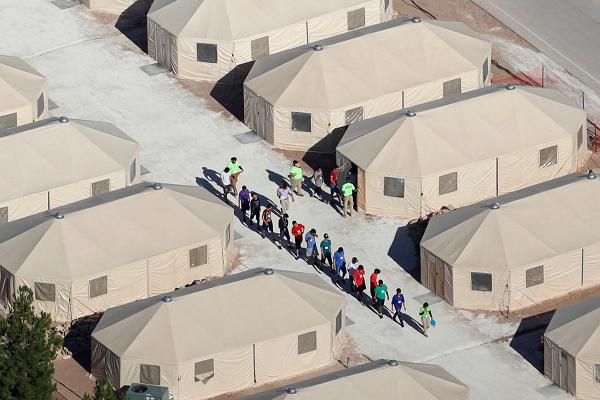 Migrant children, many of whom have been separated from their parents under the "zero tolerance" policy by the Trump administration, are being housed in tents next to the Mexican border in Tornillo, Texas, U.S. June 18, 2018.