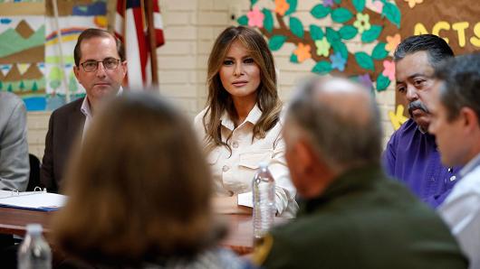First lady Melania Trump and Secretary of Health and Human Services Alex Azar (L) listen during a roundtable meeting at the Lutheran Social Services of the South "Upbring New Hope Children's Center" near the U.S.-Mexico border in McAllen Texas, June 21, 2018.