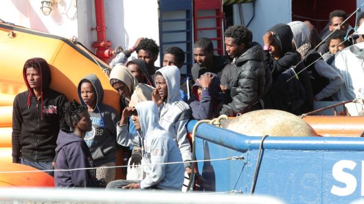 Migrants waiting to disembark on the island of Sicily on April 24, 2018.