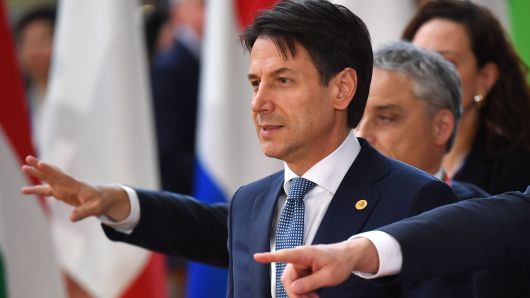 Italian Prime Minister Giuseppe Conte arrives to take part in an European Union leaders' summit focused on migration, Brexit and eurozone reforms on June 28, 2018 at the Europa building  in Brussels.