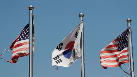 A South Korean national flag, center, and U.S. national flags fly at the Imjingak pavilion near the demilitarized zone (DMZ) in Paju, South Korea, on Saturday, April 29, 2017.