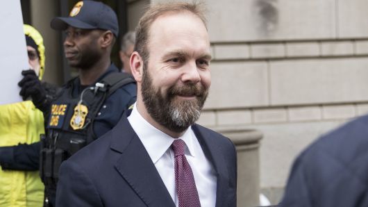 Rick Gates, former deputy campaign manager for Donald Trump, exits Federal Court in Washington, D.C., U.S., on Friday, Feb. 23, 2018.