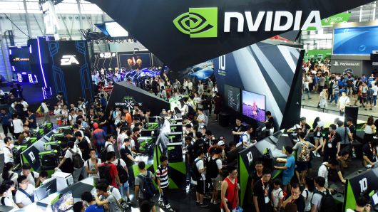 Visitors crowd around the Nvidia booth at the 2016 China Digital Entertainment Expo, known as ChinaJoy, in Shanghai.