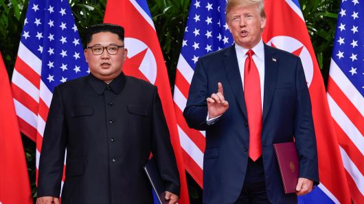 President Donald Trump makes a statement before saying goodbye to North Korea leader Kim Jong Un after their meeting in the Capella Hotel after their working lunch, on Sentosa island in Singapore June 12, 2018.