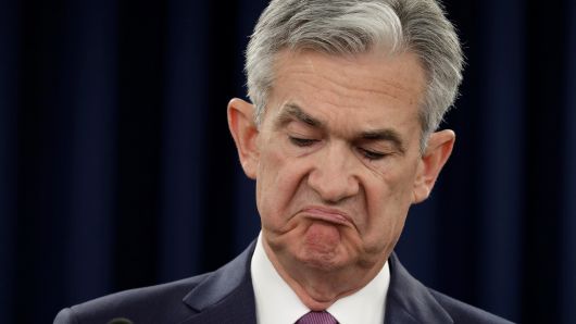 Federal Reserve Board Chairman Jerome Powell reacts at his news conference after the two-day meeting of the Federal Open Market Committee (FOMC) on interest rate policy in Washington, U.S., June 13, 2018