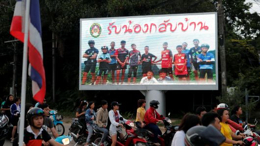 A board showing "Welcome home, boys", is seen after rescue effort has begun for the 12 schoolboys and their soccer coach trapped in Tham Luang cave, in Chiang Rai, Thailand, July 9, 2018.