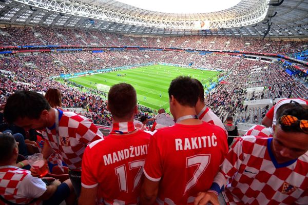 Croatia supporters stand in the tribunes prior to the Russia 2018 World Cup semi-final football match between Croatia and England at the Luzhniki Stadium in Moscow on July 11, 2018.