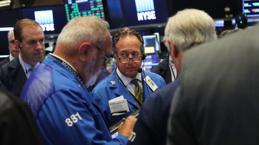 Traders work on the floor of the New York Stock Exchange on July 12, 2018 in New York City.