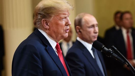 President Donald Trump and Russia's President Vladimir Putin attend a joint press conference after a meeting at the Presidential Palace in Helsinki, on July 16, 2018. 