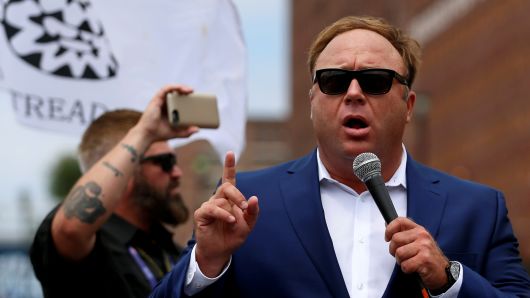 Alex Jones from Infowars.com speaks during a rally in support of Republican presidential candidate Donald Trump near the Republican National Convention in Cleveland, Ohio, U.S., July 18, 2016.