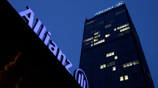 The logo of German insurer Allianz stands on the company's office buildings at Treptowers in Berlin, Germany.