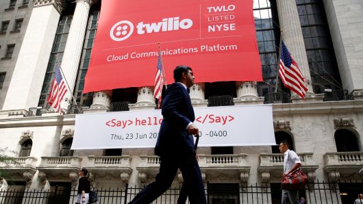A banner for communications software provider Twilio hangs on the facade of the New York Stock Exchange to celebrate the company's IPO in New York City, June 23, 2016.
